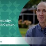 Man wearing a blue button up shirt promotes the My Community, My Health Center campaign for the Community Health Centers of Benton & Linn Counties (CHC).